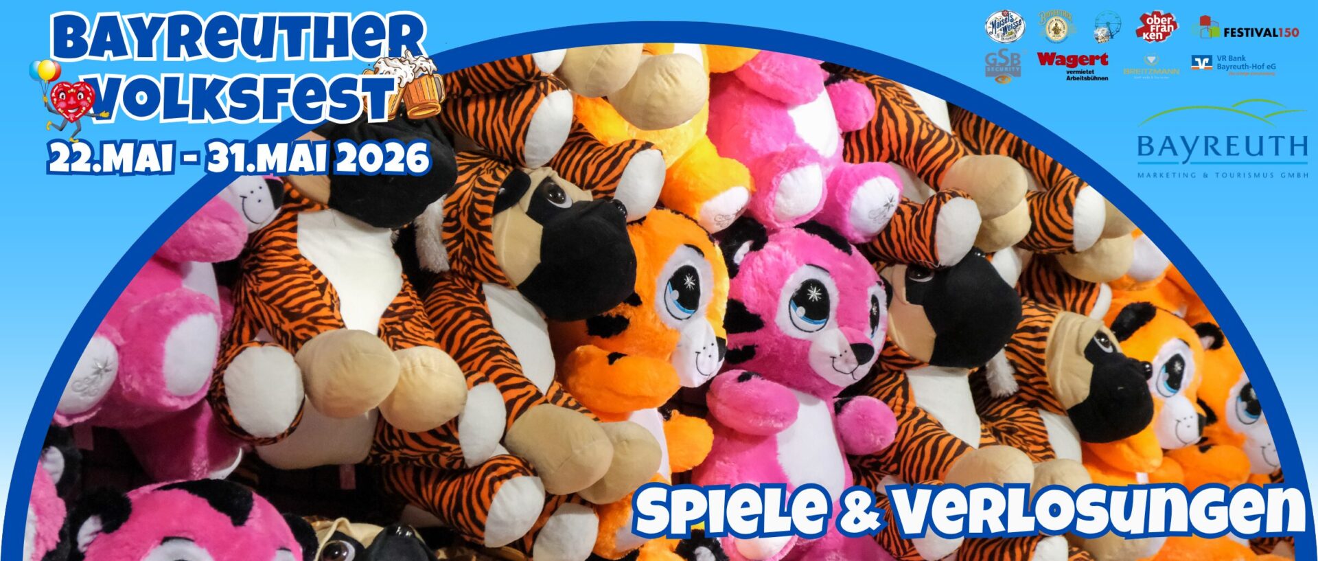 Eine bunte Wand mit Plüschtieren, darunter Tiger und rosa Bären, dient als Preis des Bayreuther Volksfest Schaustellers. Oben sind Veranstaltungshinweise und Sponsorenlogos zu sehen, in fetter Schrift werden Spiele & Verlosungen angekündigt.