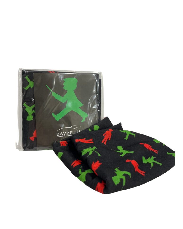 Ein gefaltetes schwarzes Tuch mit grünen und roten Fußgängersymbolen, daneben die Verpackung mit einem größeren grünen Fußgängersymbol und dem Wort Bayreuth - ab sofort im Bayreuth-Shop erhältlich.
