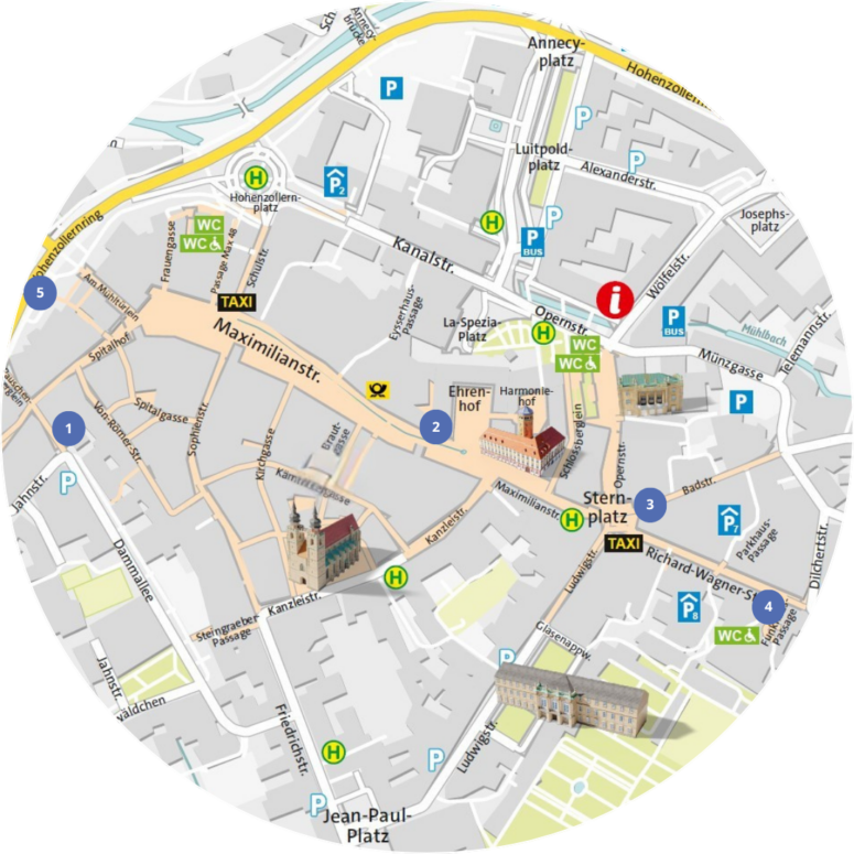 Rundkarte einer Innenstadt mit abgebildeten wichtigen Sehenswürdigkeiten, nummerierten Attraktionen, eingezeichneten Standorten von Parkplätzen, Taxiständen und Toiletten sowie beschrifteten Hauptstraßen und Plätzen. Zu den Highlights zählen Veranstaltungsorte für lokale Kleinkunstvorstellungen, damit Besucher die lebendige Kleinkunstszene der Stadt nicht verpassen.